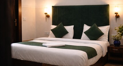 Saffron Inn - India Expo Mart Room Type - Premium Room